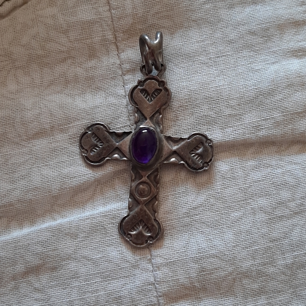 Silver necklace charm